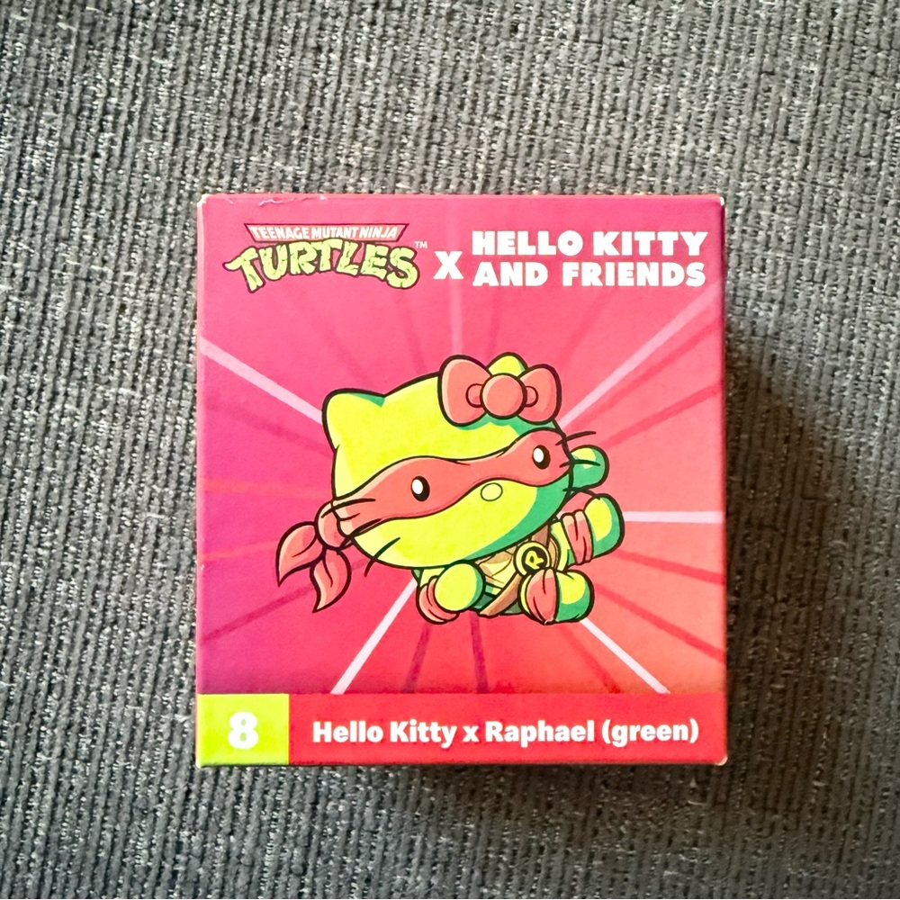McDonald's Happy Meal 2” Hello Kitty x Raphael (green)‎ figurine #8